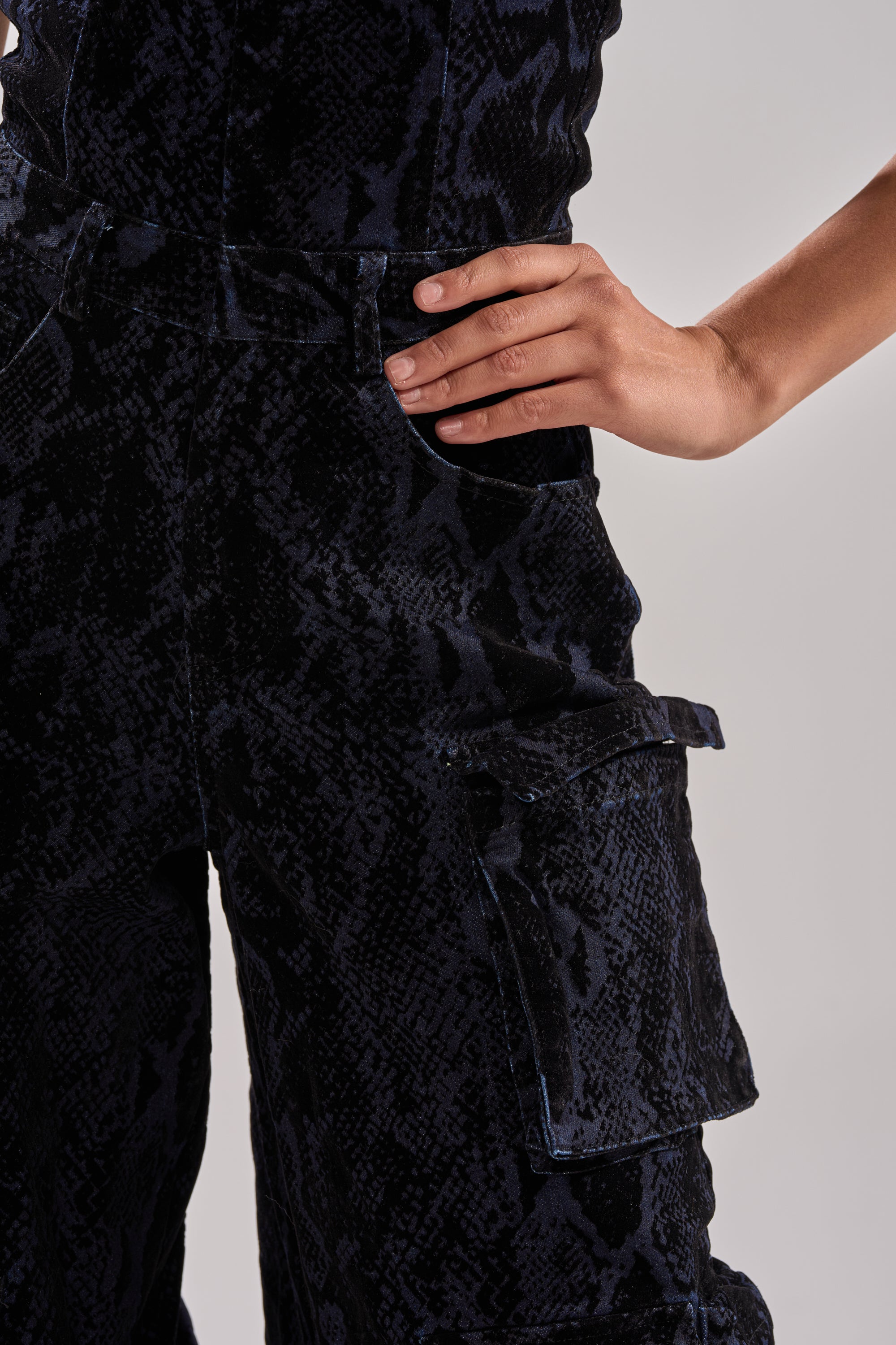 CAUGHT YOUR EYE VELVET DENIM JUMPSUIT IN SNAKEPRINT