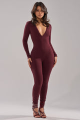 DEEP V LONG SLEEVE JUMPSUIT IN RAISIN
