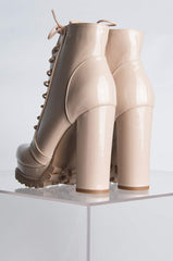 BADASS PLATFORM LACE UP BOOTIE NUDE PATENT