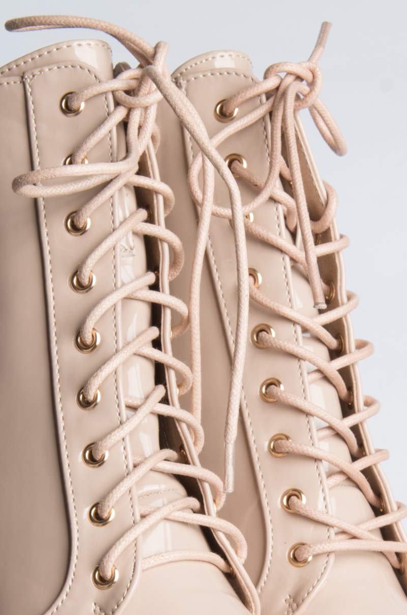 BADASS PLATFORM LACE UP BOOTIE NUDE PATENT