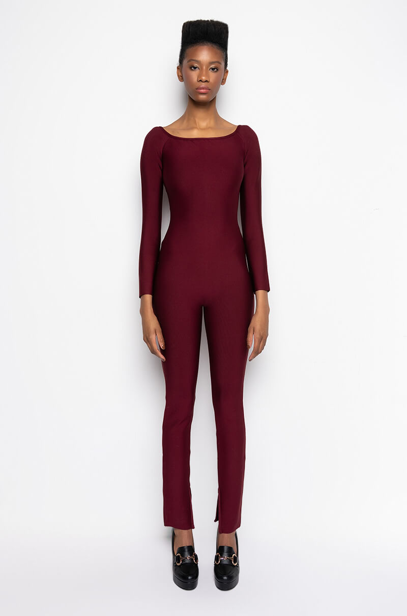 DOES WHAT SHE WANTS BANDAGE JUMPSUIT